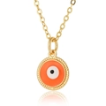 Detailed view of golden evil eye necklace pendant with orange enamel and beaded edges - Orange