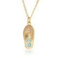 Detail of gold flip-flop pendant with sparkling crystals and evil eye charms on white base - White (D666-4)