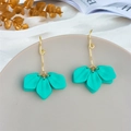 Close-up of bright lime green leaf pendant earrings with elegant golden wavy hooks - Teal (A1160)