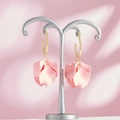 Close-up of pink petal pendant earrings with gold hooks and frosted matte texture - Light Pink Style (A1173)
