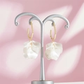 Detailed macro view of retro floral petal earrings with golden hexagonal studs and matte finish - Matte White Style (A1179)