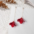 Elegant red petal tassel earrings with white pearls and gold chains on knit background - Pearlescent Red