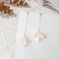 Detail of elegant pearl chain earrings with white petal drops and gold finish - Pearlescent White (A1208)