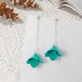 Detail of floral tassel earrings with green resin petals and elegant gold chain pearls - Turquoise Green (A1205)