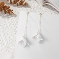 Macro detail of 925 silver needle pearl chain floral drop earrings with white petals - White (A1206)