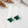 Detail of elegant emerald green petal tassel earrings with gold chains and pearls - Holographic Green