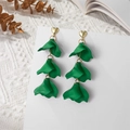 Detail of green petal long earrings with heart studs on a white display card - Dark Green (A1221)