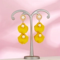 Detail of yellow flower petal earrings with hanging pearls on a pink silk background - Bright Yellow (A1394)