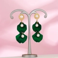 Detail of dark green petal drop earrings with pearl accents on a gold-tone metal frame - Dark Green (A1384)