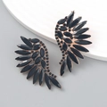 Detail of rose gold wing earrings with black marquise cut gemstones on a ceramic plate - Black Wing Style (Style B Black Rhinestone)