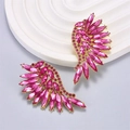 Pink crystal angel wing earrings with gold metal base on a white textured stand - Rose Red Wing Style (Style B, Rose Red Rhinestone)