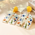 Bohemian U-shaped acrylic earrings with yellow studs and floral prints in summer light - White U-shaped Colored Floral (A159)