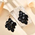 Macro detail of black matte layered flower petal earrings with gold metal ear hooks - Black (A1605)