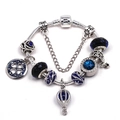 Pandora style snake chain bracelet with blue glass beads and four leaf clover pendant - 16cm