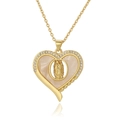 Detail of gold heart pendant with Virgin Mary relief and sparkling zircon inlay - Heart Shell Virgin Mary Style (D1011-15)