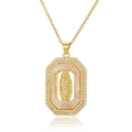 Detailed macro view of octagonal Virgin Mary pendant in gold with white crystal border - Octagon Virgin Mary Style (D1011-12)