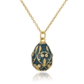 Close-up of vintage Russian egg pendant in 18K gold plating with green enamel and zircons - Dark Blue
