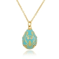 Detailed macro view of 18K gold plated Russian egg pendant with light blue enamel and zircon - Sky Blue