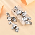 Long pleated petal tassel earrings in matte silver finish with an elegant layered drop design - Silver