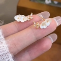Elegant gold plum blossom stud earrings with white pearl petals and sparkling leaf crystals - No.21 Double Rhinestone Stem Flower (HHH0150)