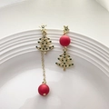 Detailed shot of asymmetric Christmas tree earrings with red beads and green crystals - Asymmetric Star Christmas Tree (A500)