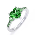 Elegant heart-shaped green crystal ring with pavé side stones on a silver-white band - US 5 / Green