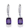 Detailed macro view of purple rectangle-cut gemstones on silver leverback earrings - Purple