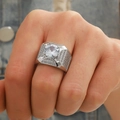 Macro shot of silver luxury men's ring with square frame and pavé diamond detailing - US-6 / White Gold
