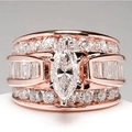 Luxuriöser Ring mit Marquise-Kristall und Baguette-Akzenten in Roségold-Optik - US 5 / Roségold