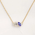 Birthstone water drop pendant necklace in gold with emerald-cut clear and blue stones - June