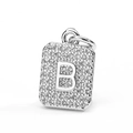 Close-up of silver-plated rectangular pendant with micro-pave zircons and relief letter B - Letter B