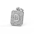Macro shot of silver square letter D pendant with sparkling zircon micro-pave setting - Letter D