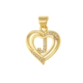 Macro detail of a heart-shaped gold pendant with cubic zirconia and letter J engraving - Letter J