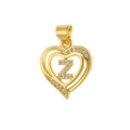 Close-up of gold heart pendant with cubic zirconia and letter Z engraving detail - Letter Z