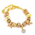 Adjustable gold charm bracelet featuring a pavé heart pendant and bow details - 16cm / Beaded Bracelet / Gold