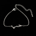 Silver bracelet featuring Arabic 'Love' calligraphy charm with sparkling zircons - Bracelet - Silver