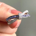 Minimalist silver bow ring with purple sapphire and white diamond pavé settings - US 7 / Purple