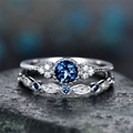 Elegante vintage zilveren saffier ringenset met blauwe steen en zirkonia halo - US 6 / Blauw