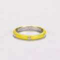Macro shot of S925 silver ring with yellow enamel finish and embedded cubic zirconia - US 6 / Yellow