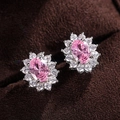 Pink oval cubic zirconia stud earrings with halo micro-set diamonds in silver finish - Pink