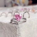 Luxury silver V-shaped ring with a heart-shaped pink gemstone and micro-pave setting - Pink / US 5