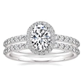 Elegant oval-cut halo bridal ring set with matching pave bands in silver finish - US 7 / White Gold