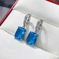 Elegant silver drop earrings with emerald-cut blue zircons and micro-pave crystals - Aqua