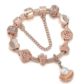 Rose gold snake chain bracelet with starfish shells and pearl charms on white backdrop - 16cm / Ocean Shell & Artificial Pearl Style (Model 003)