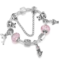 Bracciale a perline argentato con perle di vetro rosa e ciondoli a forma di orso e cuore - Confezione Regalo Delfino in Vetro Rosa (Stile 013)