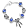 Silver snake chain bracelet with blue crystals and dreamcatcher feather charms - Blue / 20cm