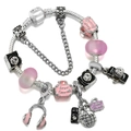 Travel theme charm bracelet with camera, luggage, and pink beads on silver snake chain - Style 006