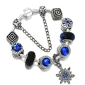 Starry sky themed beaded bracelet with dark blue crystals and silver sun pendant charm - Style 008