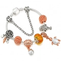 Ocean themed charm bracelet with turtle shell mermaid pendants and blue glass beads - Ocean Love Theme (007)