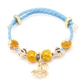 Blaues geflochtenes Lederarmband mit goldenen Bienen- und Honigfruchtanhängern - Bienenblau Geflochten (Farbe 03)